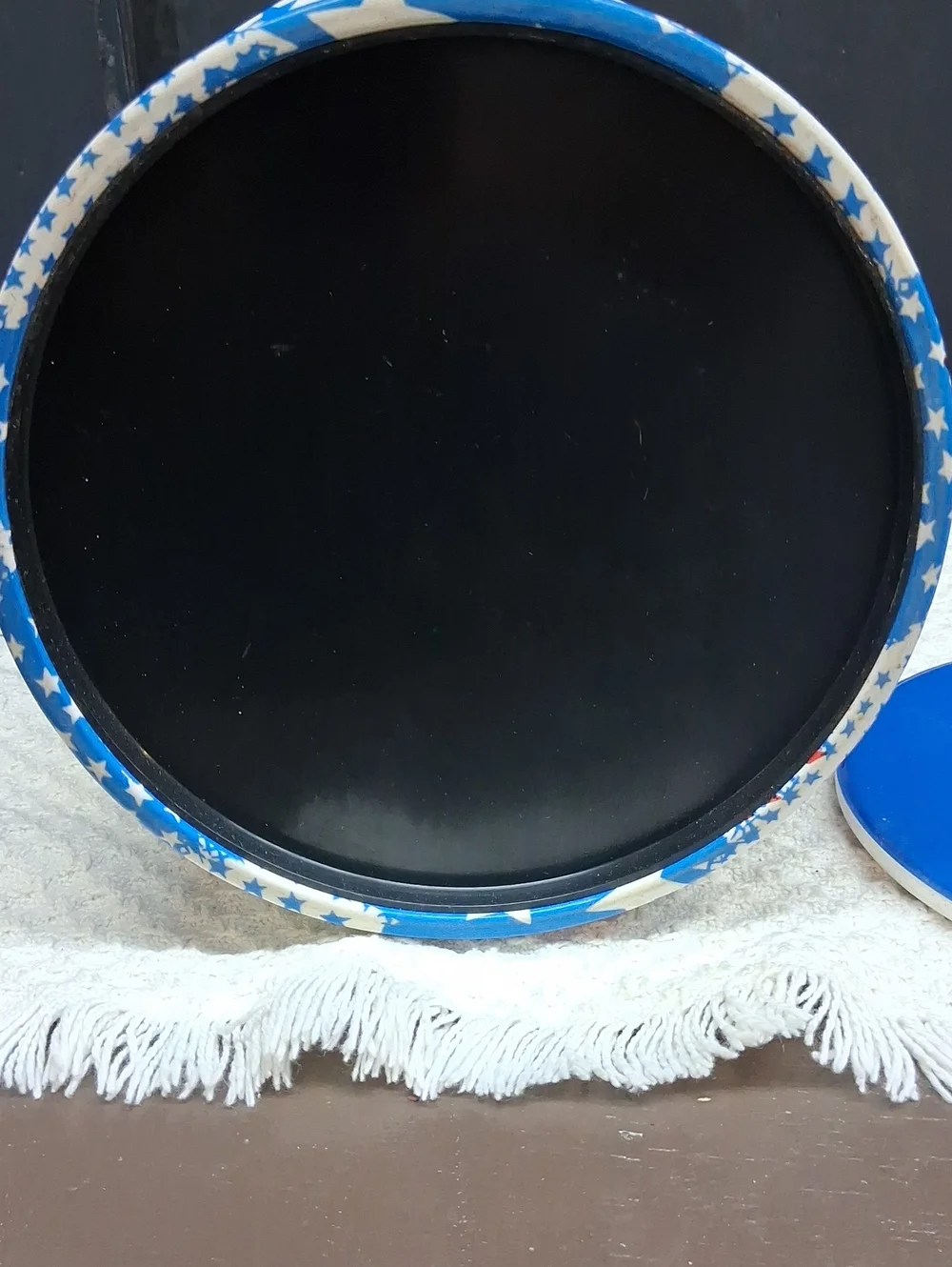 Patriotic Mr. Ice Bucket features a vibrant USA flag pattern& sturdy blue handle